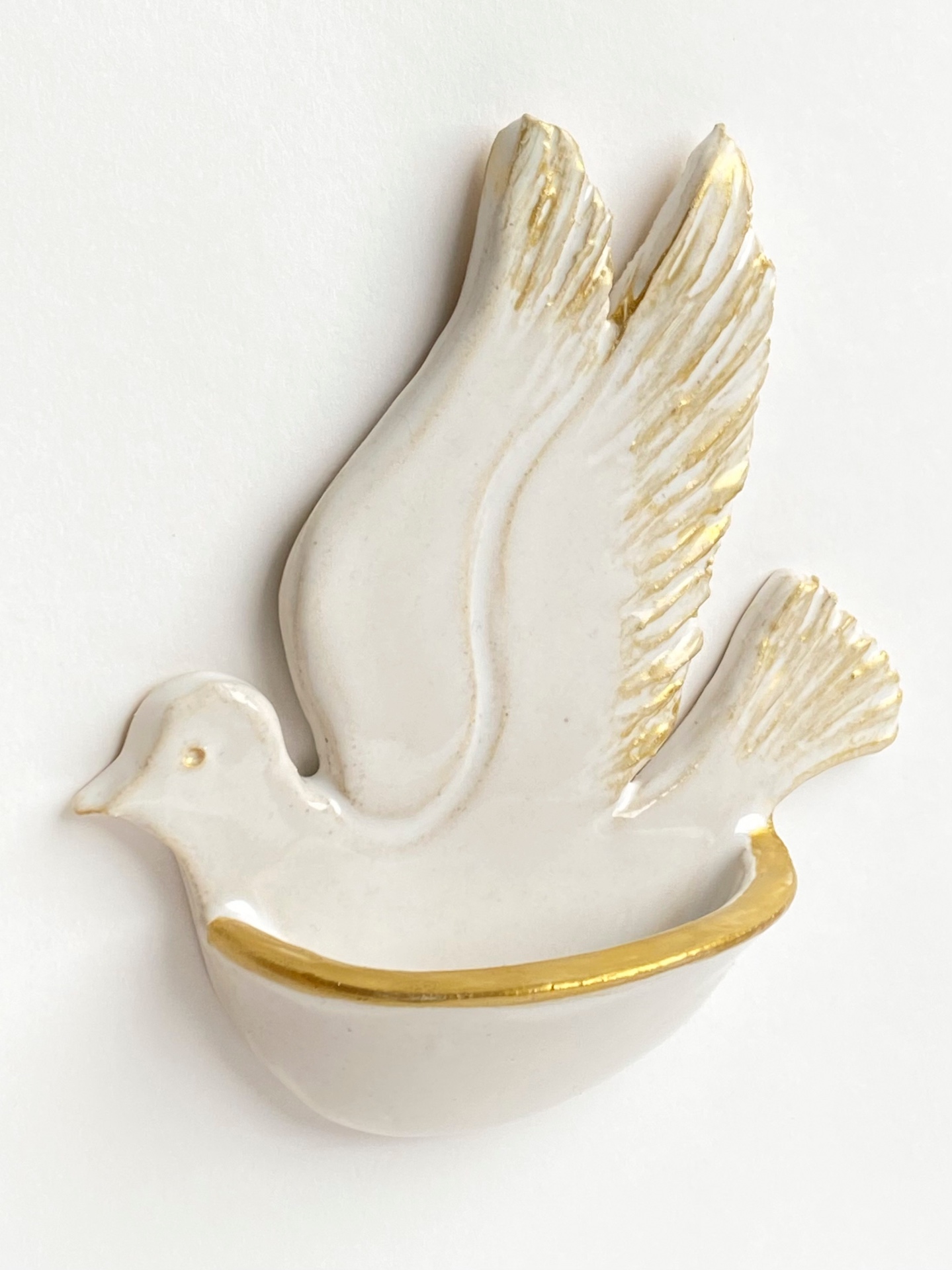 Ivory dove holy water font with gilded wings